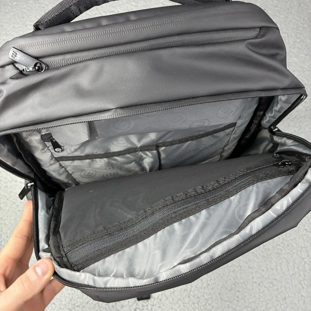 TravisMathew Backpack Black Laptop Travel Bag QISG Quanta Services Logo NWT